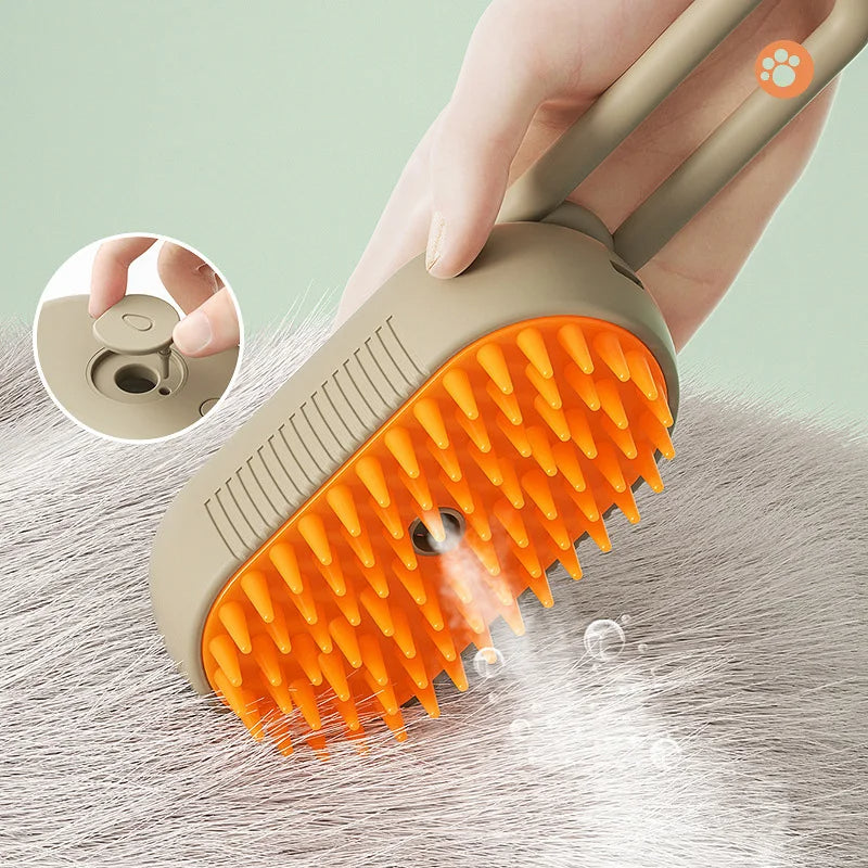 Pet grooming brush with orange bristles being used on a surface, with a close-up inset showing the brush head.