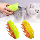 Two cat grooming tools with a green and yellow design, one being used on a cat.