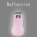 Pink reflective dog vest on a gray background with 'Reflective' text.