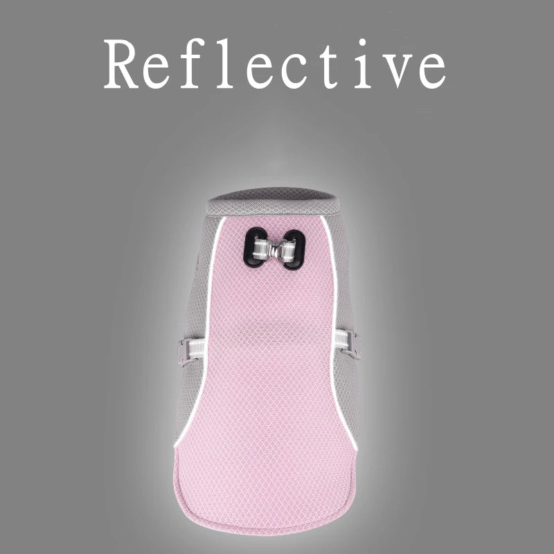 Pink reflective dog vest on a gray background with 'Reflective' text.