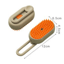 Pet grooming brush with orange bristles and beige handle, showing dimensions on a white background.