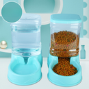Pet water and food dispenser with water and food inside on a light blue background